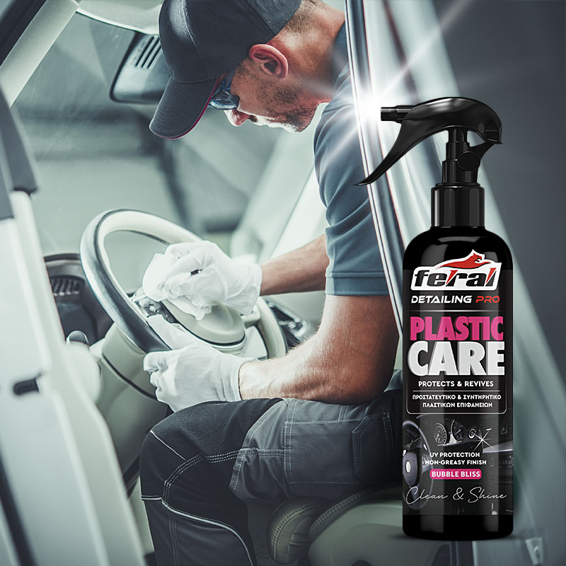 Rear view of a young man using detergent for and microfiber clot